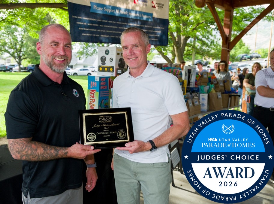 Parade of Homes Sponsor Charlie Behan awards David Nielsen, VP of Operations at Candlelight Homes, with the 2026 Judges’ Choice Award